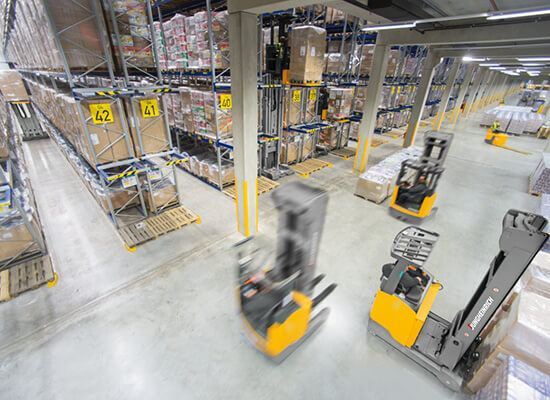 Jungheinrich Class 2 Moving Mast Reach Trucks Driving and Moving Materials in a Warehouse